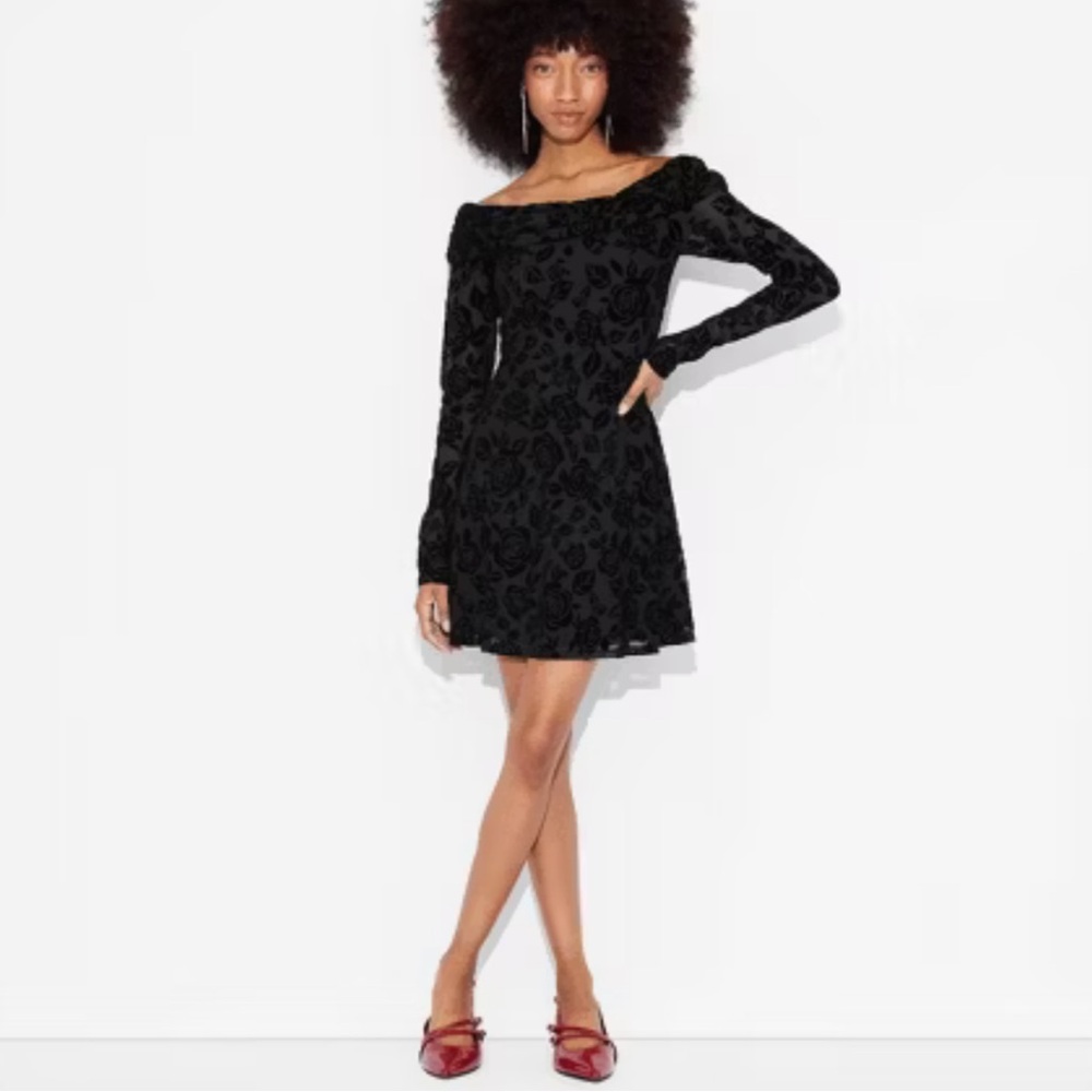 Black flocked off the shoulder mini dress